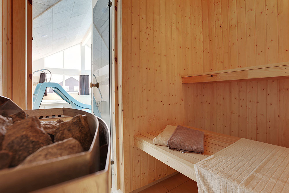 Husets sauna giver livsnyderen en ultimativ mulighed for velvære.