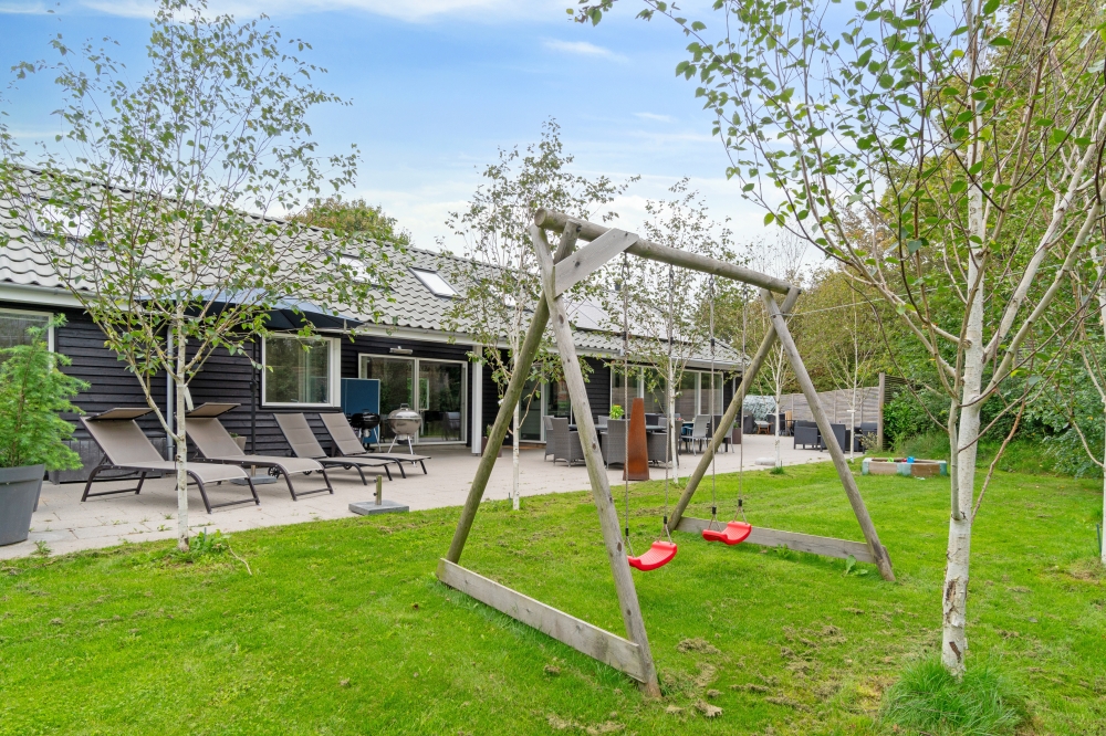 Luksushus nr. 339 har en dejlig terrasse med gode havemøbler til 16 personer.