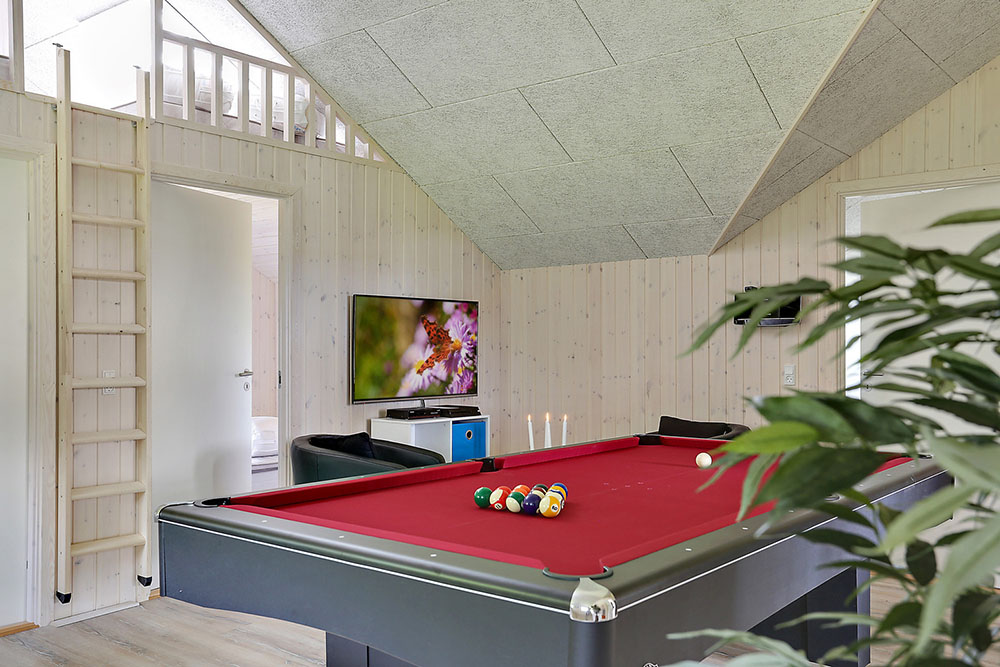 Ud over de mange timer, man kan bruge i husets pool-afdeling, så byder luksushus 349 også på billard/bordtennis og dart