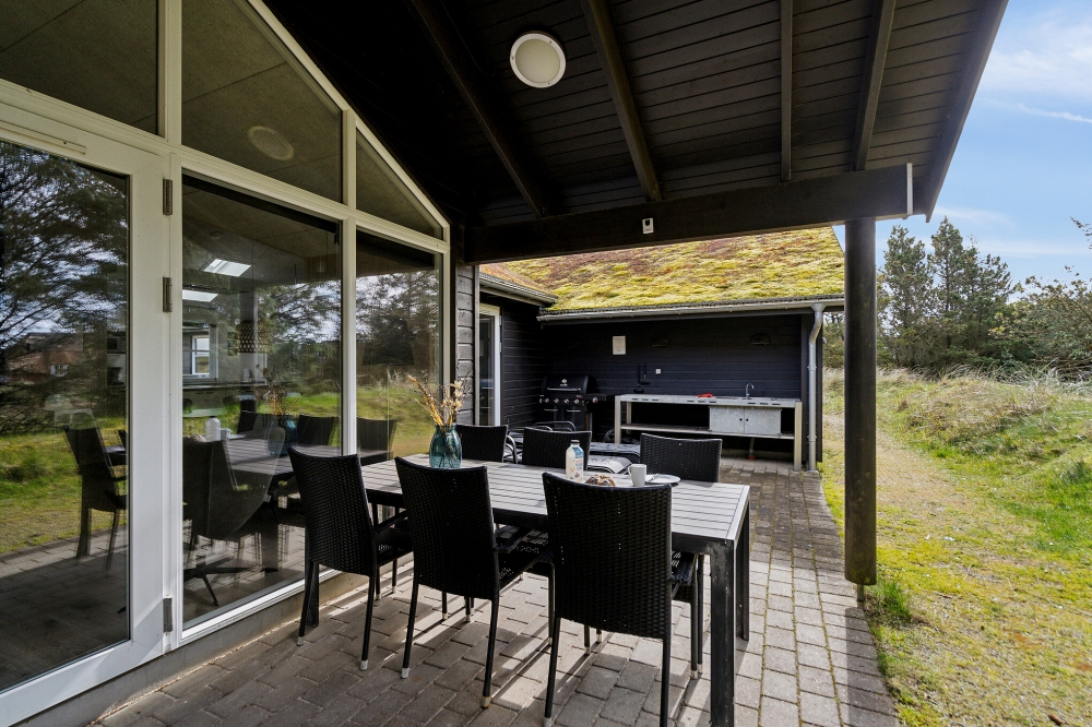 Nyd en grillaften på terrassen i luksushus nr. 371 i Vestjylland