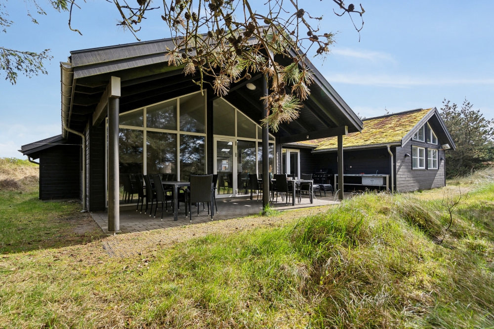 Dette skønne poolhus nr. 371 med plads til 21 personer ligger i Vestjylland