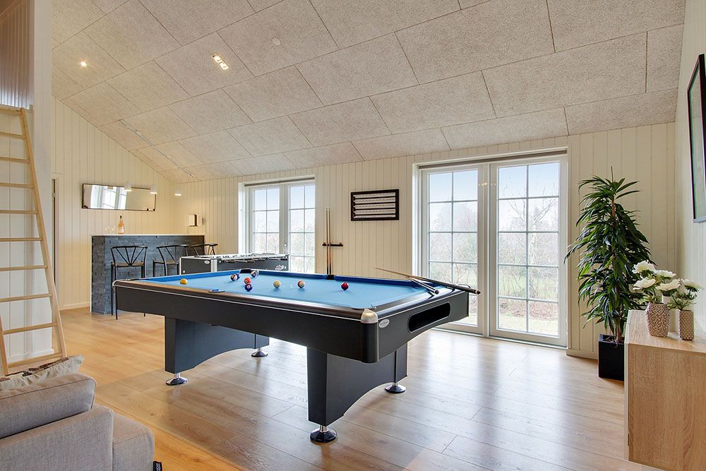 Ud over de mange timer, man kan bruge i husets pool-afdeling, så byder luksushus 386 også på billard/bordtennis og dart