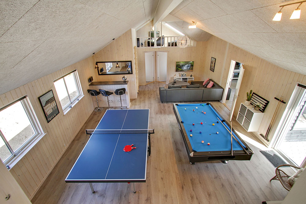Ud over de mange timer, man kan bruge i husets pool-afdeling, så byder luksushus 394 også på billard/bordtennis og dart