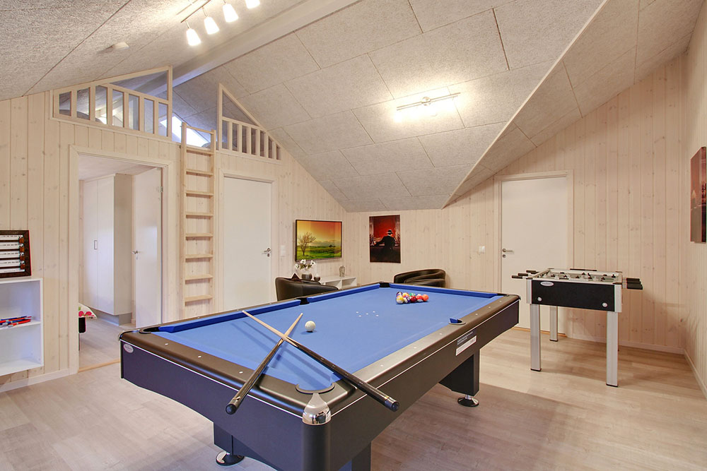 Ud over de mange timer, man kan bruge i husets pool-afdeling, så byder luksushus 702 også på billard/bordtennis og dart