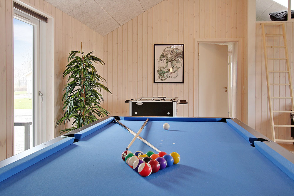 Ud over de mange timer, man kan bruge i husets pool-afdeling, så byder luksushus 703 også på billard/bordtennis og dart