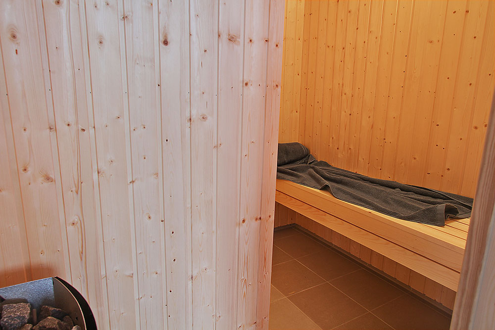 Nyd varmen i saunaen i luksushus nr. 708 til 12 personer