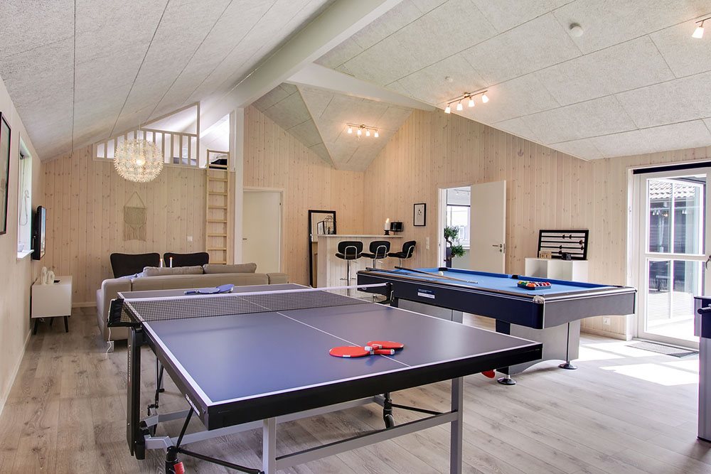 Ud over de mange timer, man kan bruge i husets pool-afdeling, så byder luksushus 714 også på billard/bordtennis og dart
