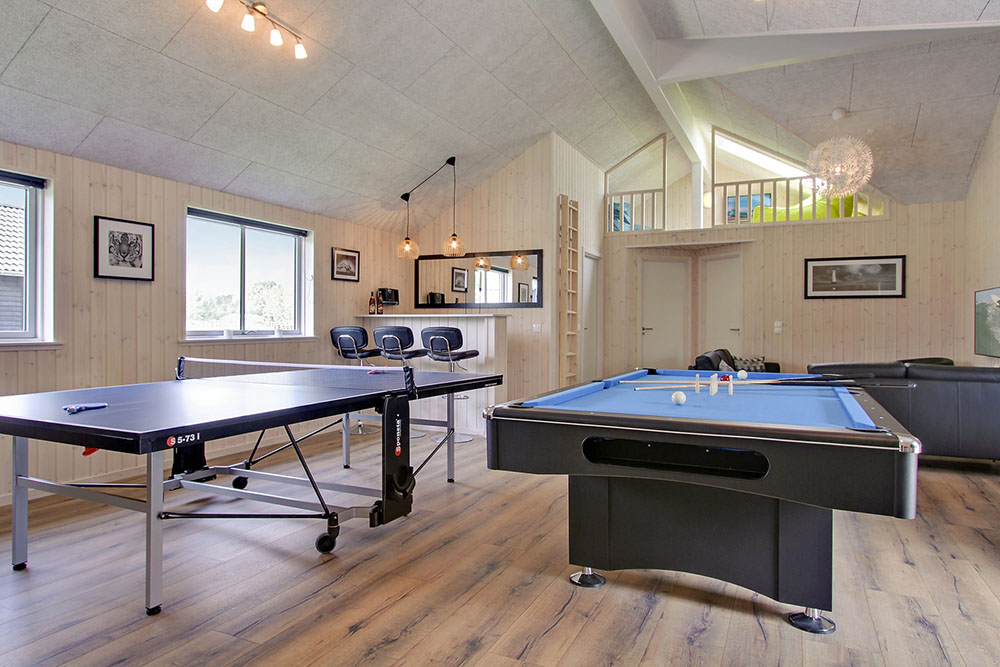 Ud over de mange timer, man kan bruge i husets pool-afdeling, så byder luksushus 707 også på billard/bordtennis og dart