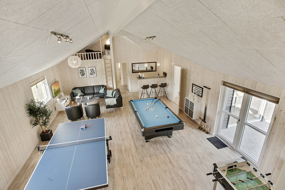 Ud over de mange timer, man kan bruge i husets pool-afdeling, så byder luksushus 406 også på billard/bordtennis og dart
