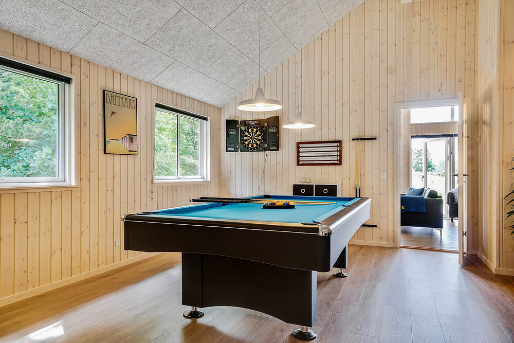Ud over de mange timer, man kan bruge i husets pool-afdeling, så byder luksushus 416 også på billard/bordtennis og dart