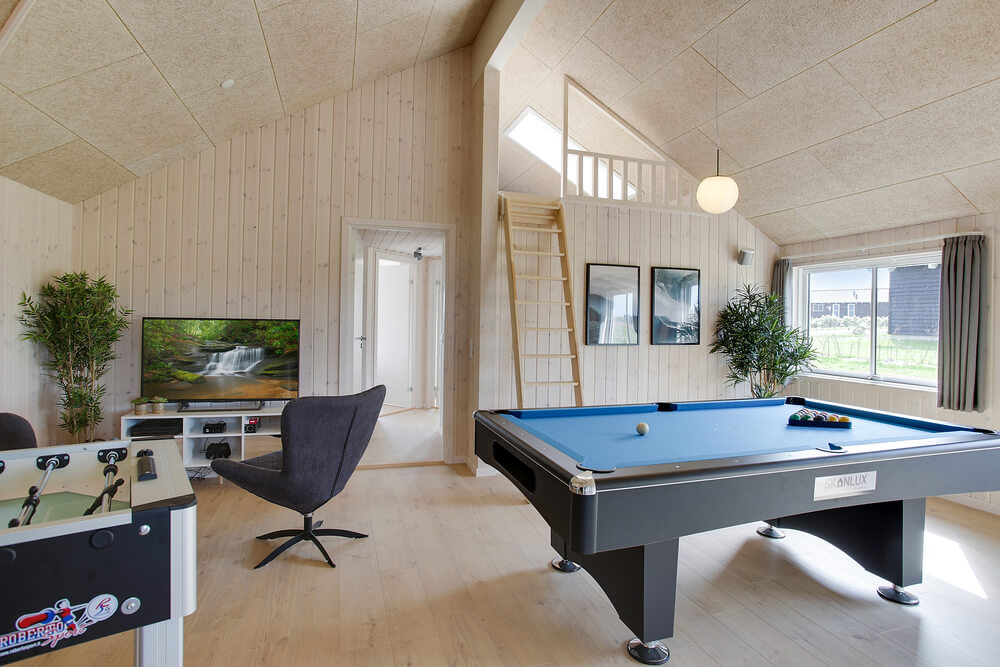 Ud over de mange timer, man kan bruge i husets pool-afdeling, så byder luksushus 418 også på billard/bordtennis og dart