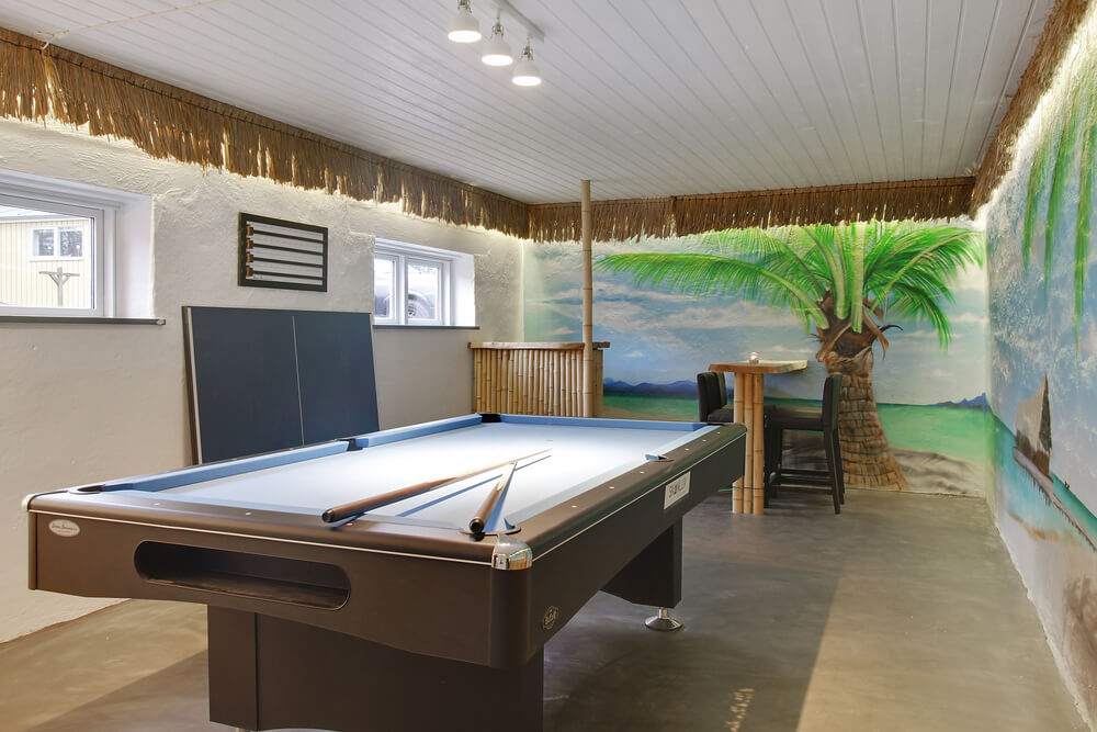 Ud over de mange timer, man kan bruge i husets pool-afdeling, så byder luksushus 423 også på billard/bordtennis og dart