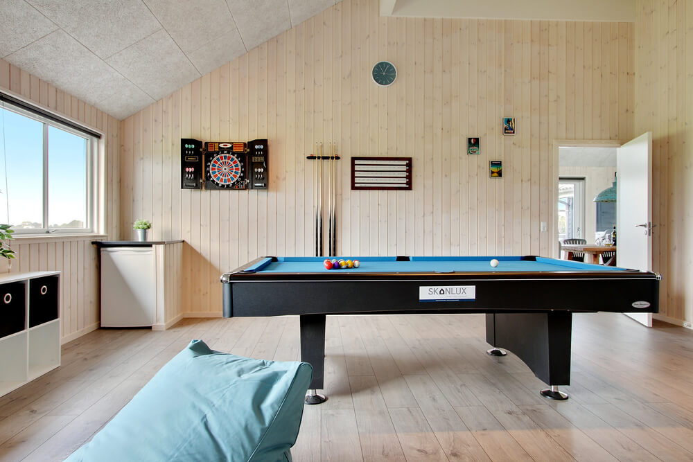 Ud over de mange timer, man kan bruge i husets pool-afdeling, så byder luksushus 424 også på billard/bordtennis og dart