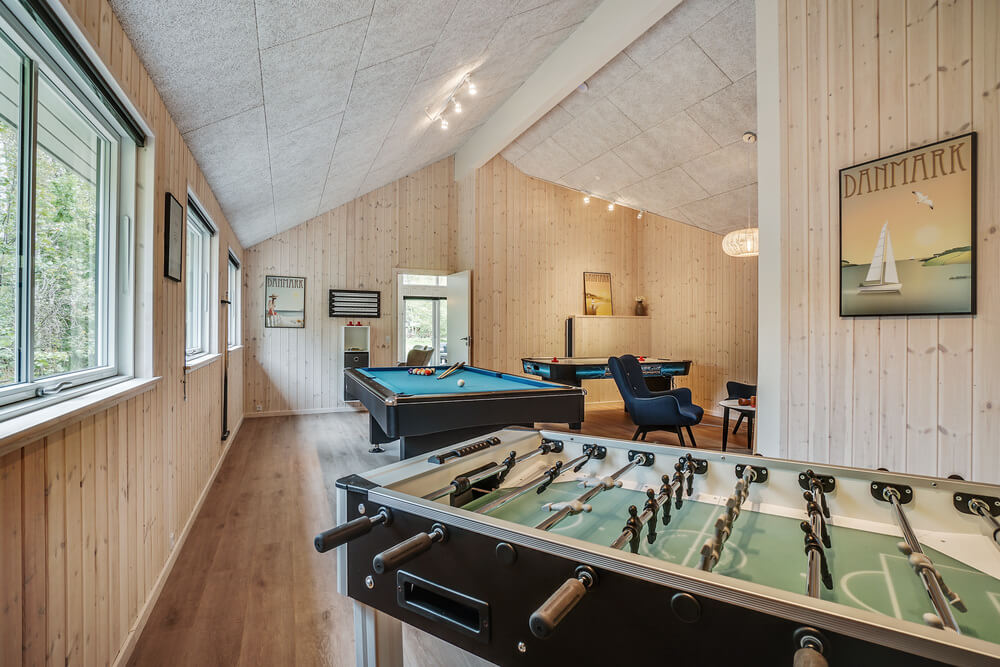 Ud over de mange timer, man kan bruge i husets pool-afdeling, så byder luksushus 434 også på billard/bordtennis og dart