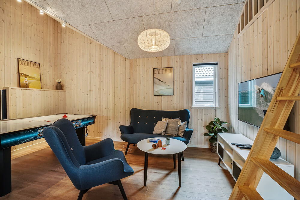 Dyst i sommerhusets aktivitetsrum, når I besøger luksushus nr. 434 i Nordsjælland.