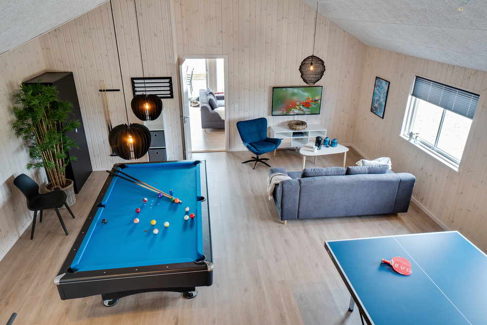 Ud over de mange timer, man kan bruge i husets pool-afdeling, så byder luksushus 456 også på billard/bordtennis og dart