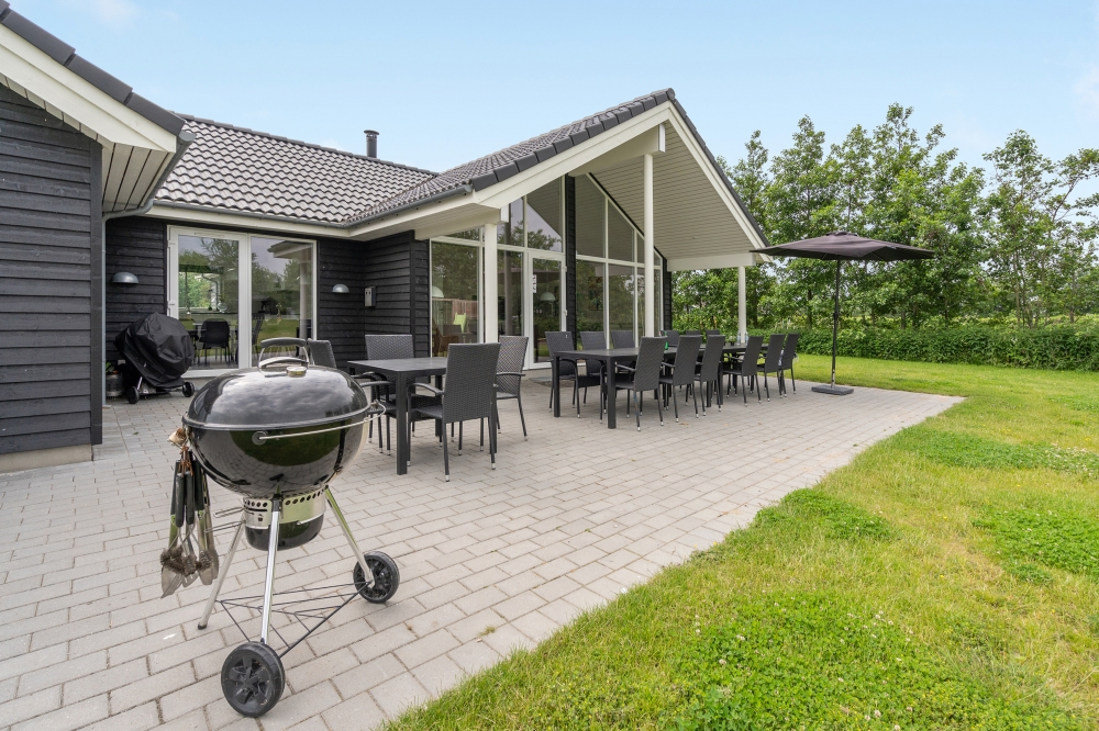 Nyd en grillaften på terrassen i luksushus nr. 481 i Lolland/Falster/Møn