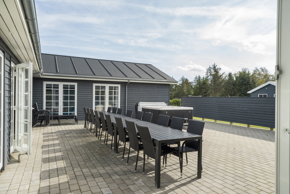 Nyd en grillaften på terrassen i luksushus nr. 500 i Nordjylland