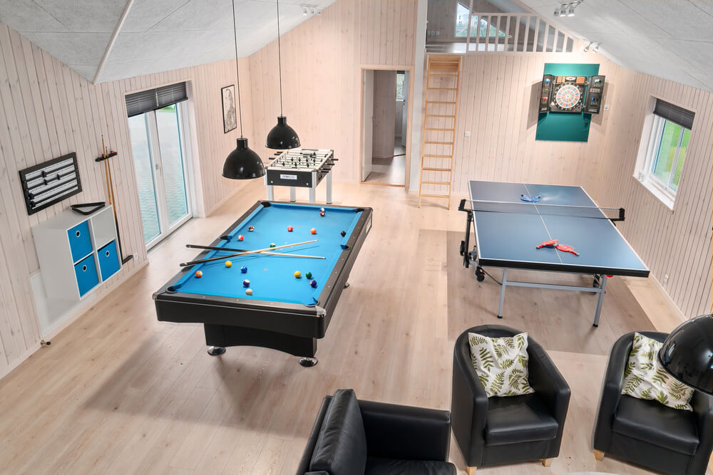 Ud over de mange timer, man kan bruge i husets pool-afdeling, så byder luksushus 730 også på billard/bordtennis og dart