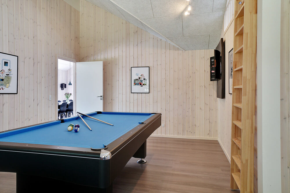 Ud over de mange timer, man kan bruge i husets pool-afdeling, så byder luksushus 519 også på billard/bordtennis og dart