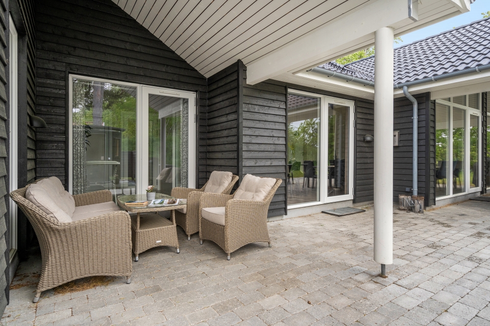 Nyd en grillaften på terrassen i luksushus nr. 519 i Lolland/Falster/Møn