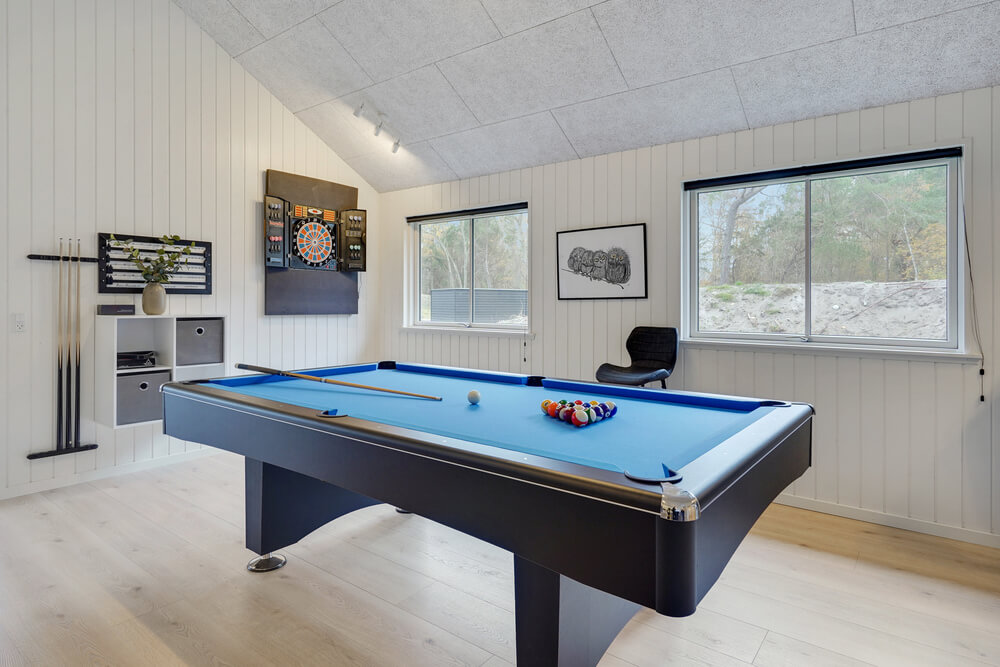 Ud over de mange timer, man kan bruge i husets pool-afdeling, så byder luksushus 509 også på billard/bordtennis og dart