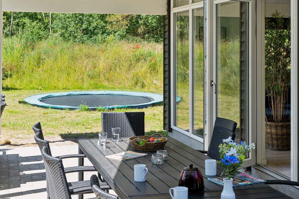 Nyd en grillaften på terrassen i luksushus nr. 502 i Lolland/Falster/Møn