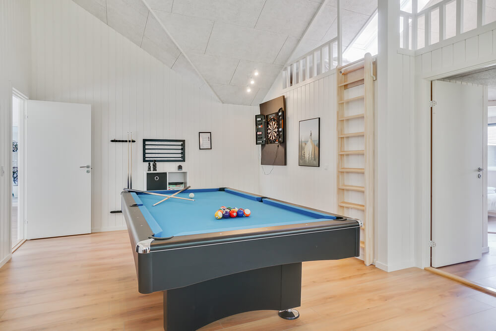 Ud over de mange timer, man kan bruge i husets pool-afdeling, så byder luksushus 515 også på billard/bordtennis og dart
