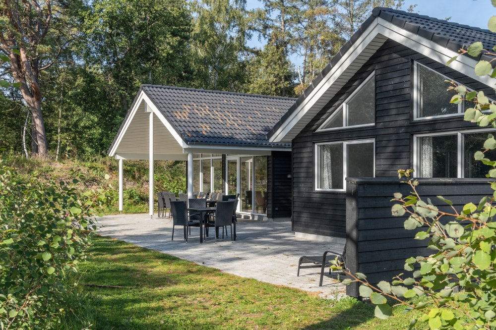 Nyd en grillaften på terrassen i luksushus nr. 517 i Lolland/Falster/Møn