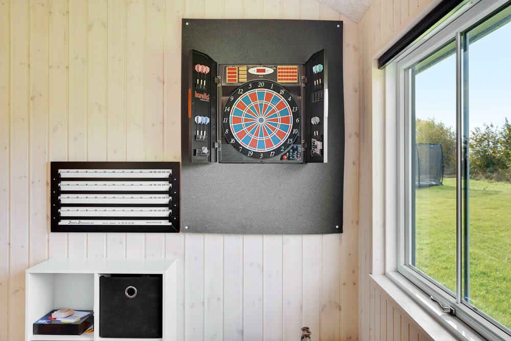 Dyst i sommerhusets aktivitetsrum, når I besøger luksushus nr. 521 i Sydjylland.