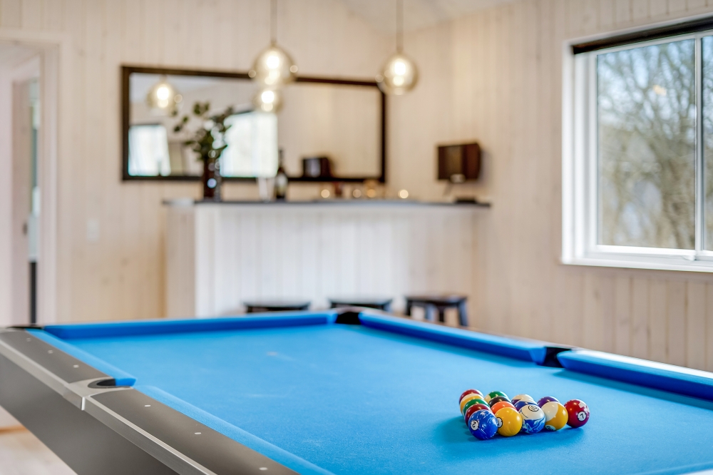 Ud over de mange timer, man kan bruge i husets pool-afdeling, så byder luksushus 527 også på billard/bordtennis og dart