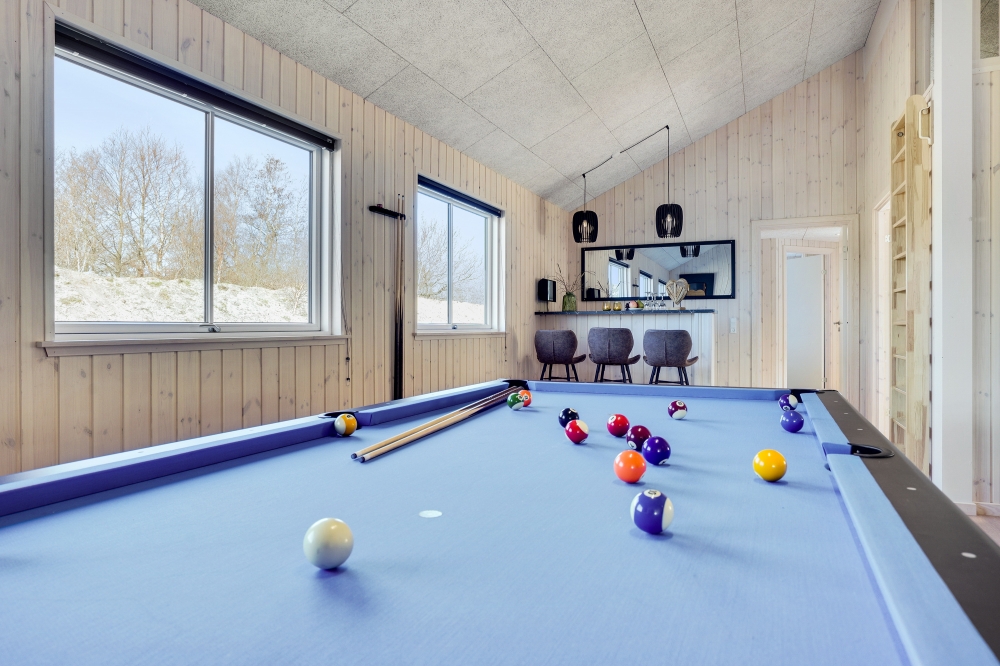 Ud over de mange timer, man kan bruge i husets pool-afdeling, så byder luksushus 523 også på billard/bordtennis og dart