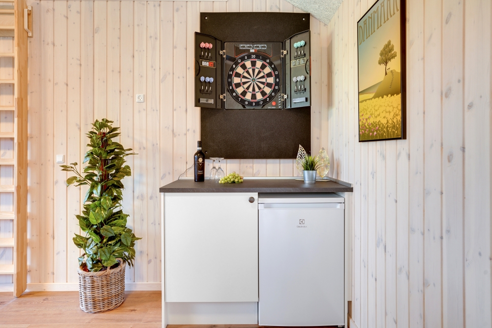 Dyst i sommerhusets aktivitetsrum, når I besøger luksushus nr. 544 i Østjylland.