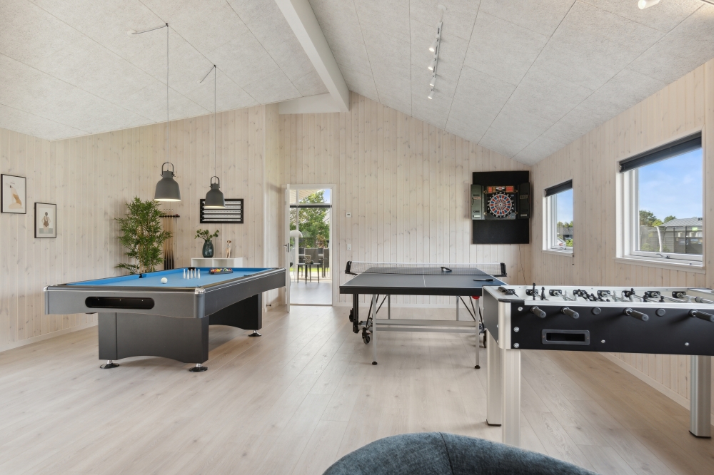 Ud over de mange timer, man kan bruge i husets pool-afdeling, så byder luksushus 577 også på billard/bordtennis og dart