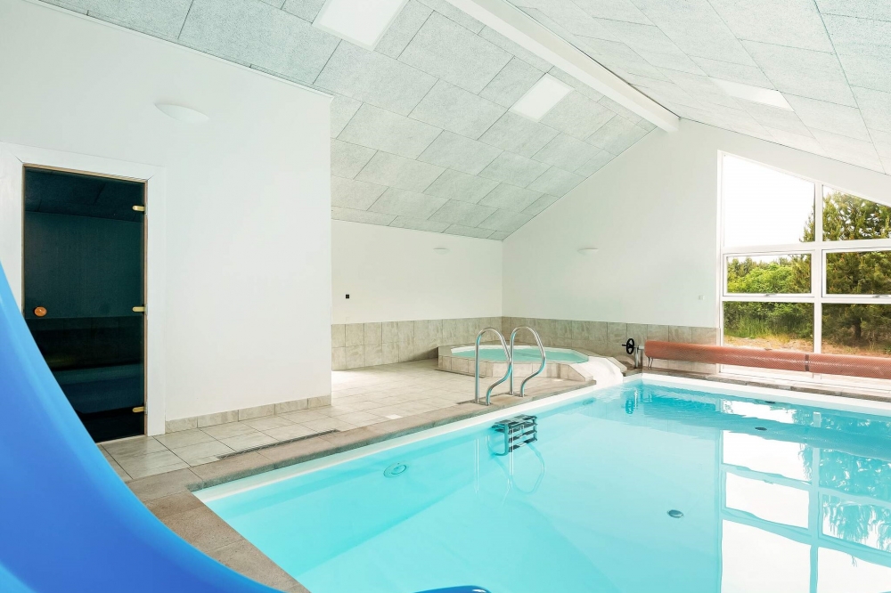 Tag en dukkert i poolen i luksushus nr. 602 i Nordjylland.