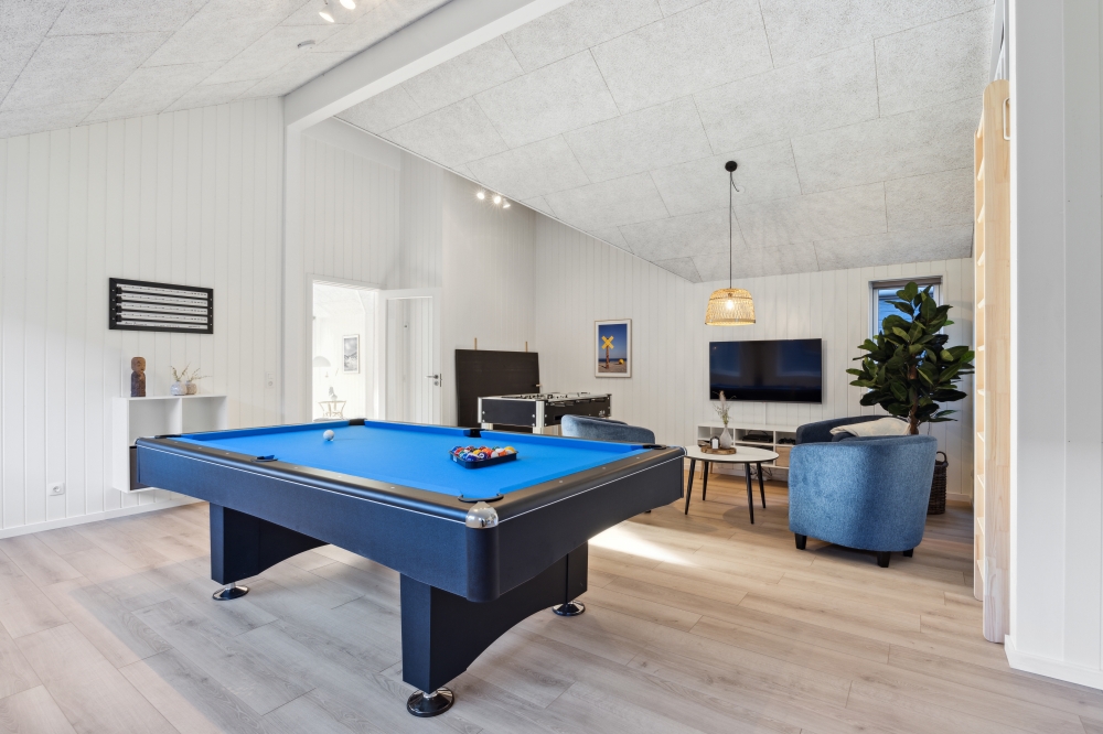 Ud over de mange timer, man kan bruge i husets pool-afdeling, så byder luksushus 759 også på billard/bordtennis og dart