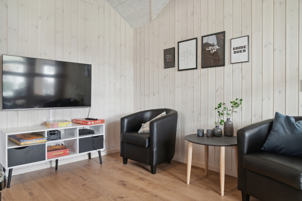 Dyst i sommerhusets aktivitetsrum, når I besøger luksushus nr. 588 i Lolland/Falster/Møn.
