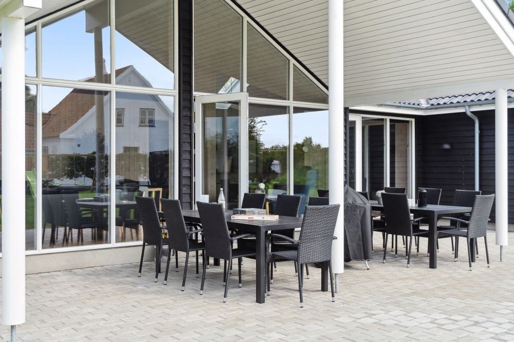 Nyd en grillaften på terrassen i luksushus nr. 588 i Lolland/Falster/Møn