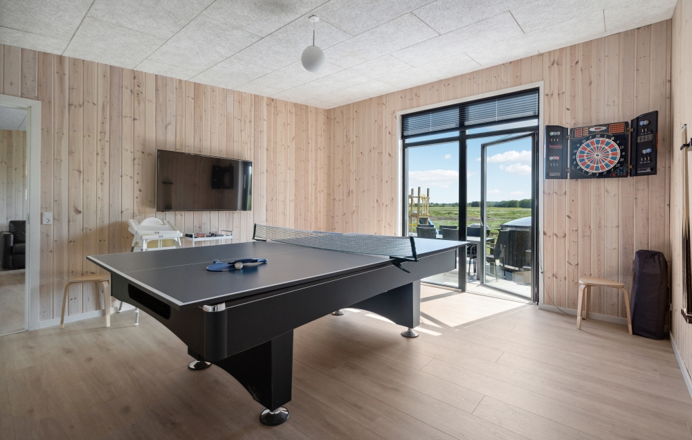 Ud over de mange timer, man kan bruge i husets pool-afdeling, så byder luksushus 604 også på billard/bordtennis og dart