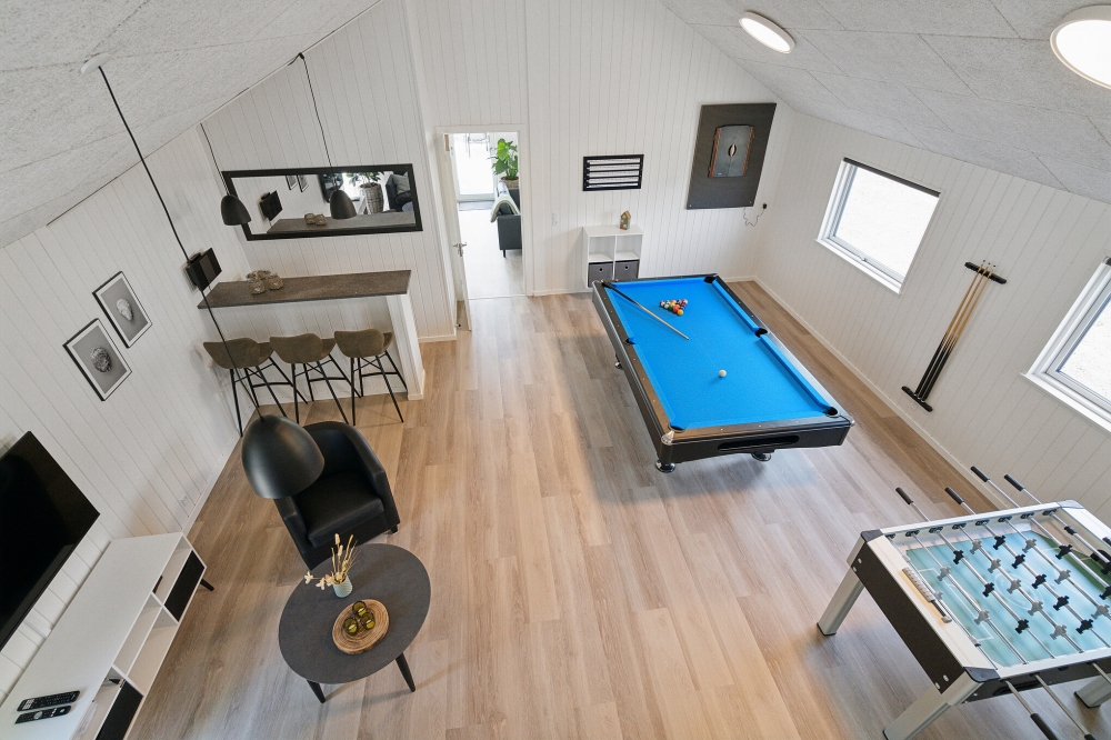 Ud over de mange timer, man kan bruge i husets pool-afdeling, så byder luksushus 614 også på billard/bordtennis og dart