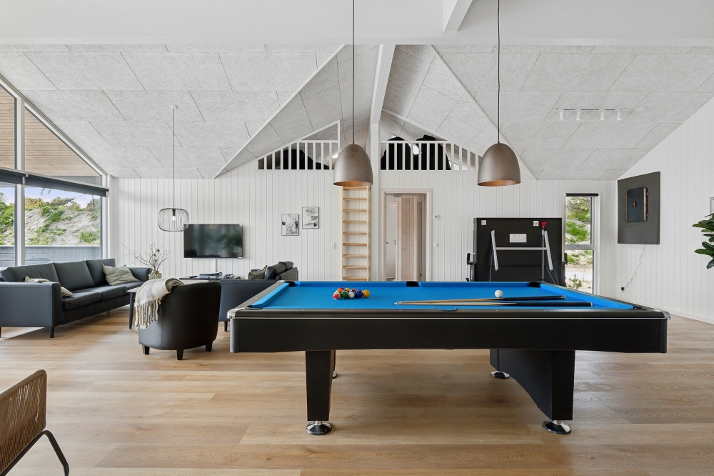 Ud over de mange timer, man kan bruge i husets pool-afdeling, så byder luksushus 615 også på billard/bordtennis og dart