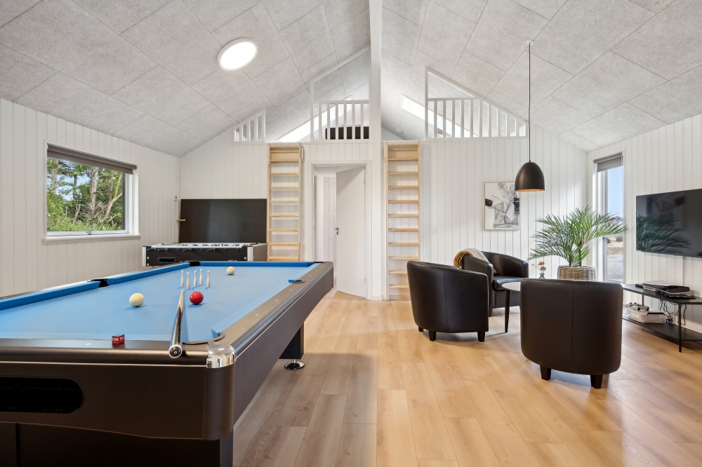 Ud over de mange timer, man kan bruge i husets pool-afdeling, så byder luksushus 616 også på billard/bordtennis og dart