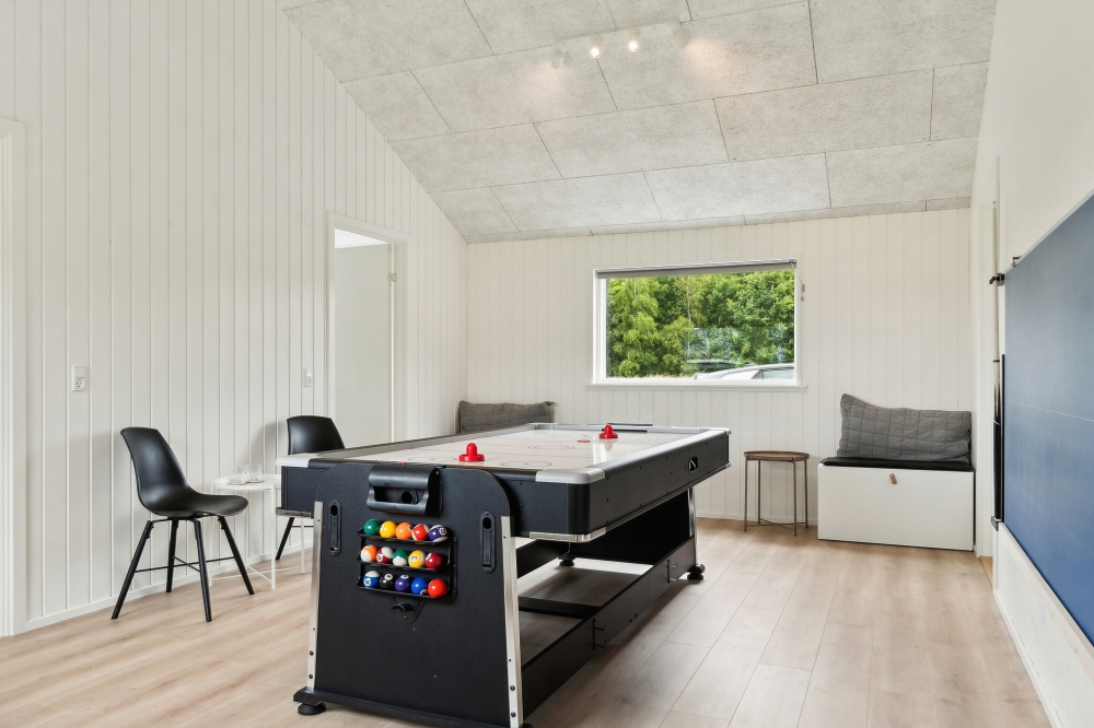 Ud over de mange timer, man kan bruge i husets pool-afdeling, så byder luksushus 620 også på billard/bordtennis og dart
