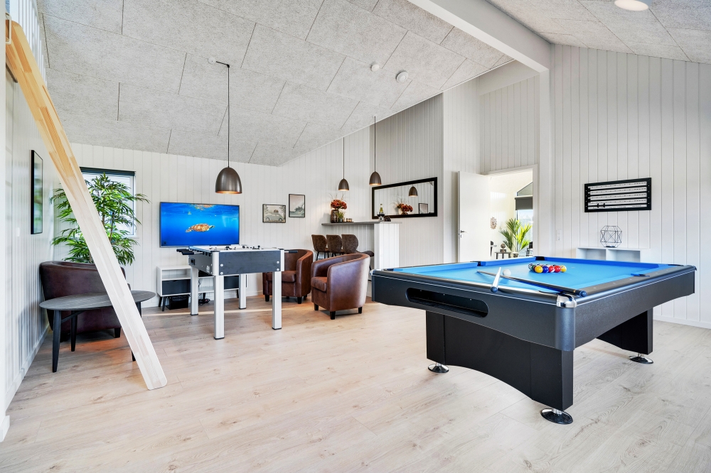 Ud over de mange timer, man kan bruge i husets pool-afdeling, så byder luksushus 621 også på billard/bordtennis og dart