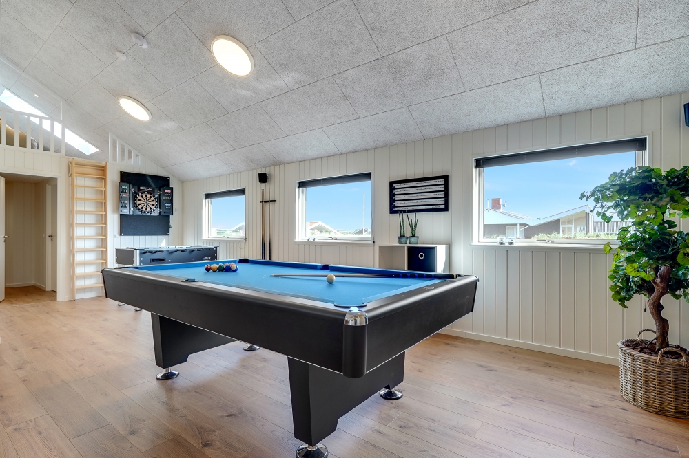 Ud over de mange timer, man kan bruge i husets pool-afdeling, så byder luksushus 622 også på billard/bordtennis og dart
