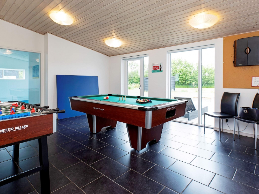 Ud over de mange timer, man kan bruge i husets pool-afdeling, så byder luksushus 626 også på billard/bordtennis og dart