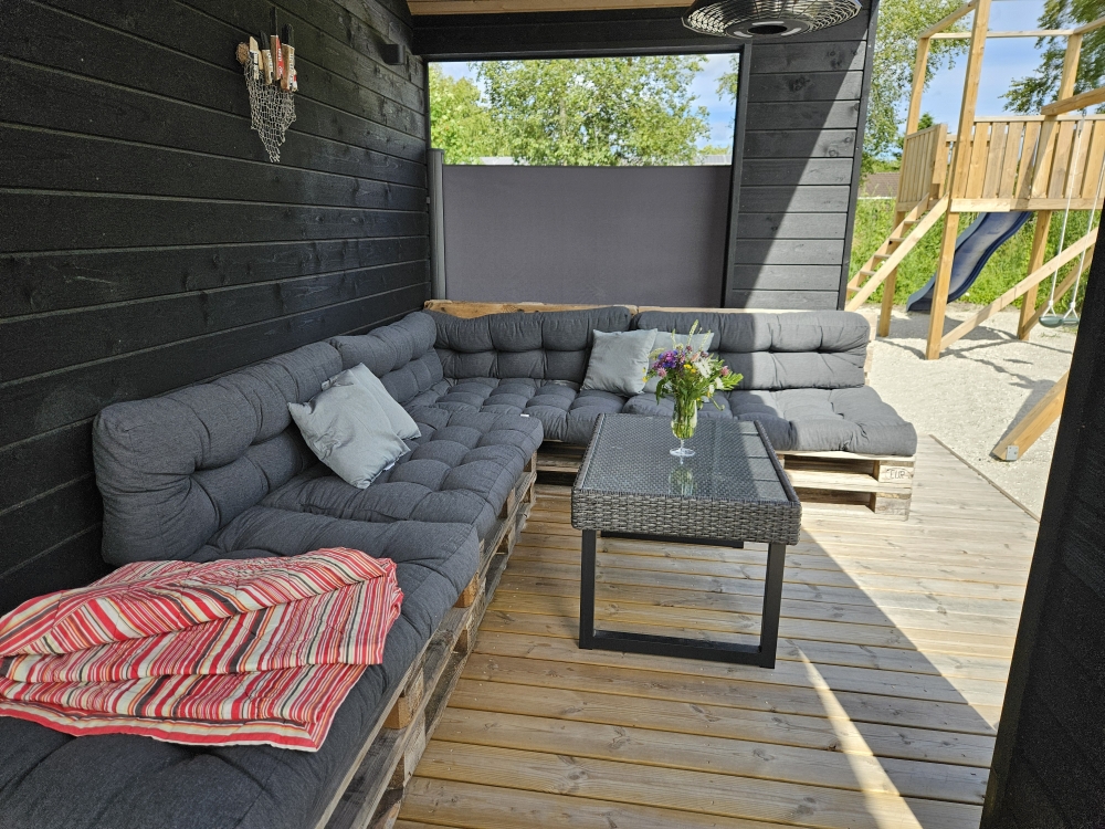 Luksushus nr. 628 har en dejlig terrasse med gode havemøbler til 12 personer.