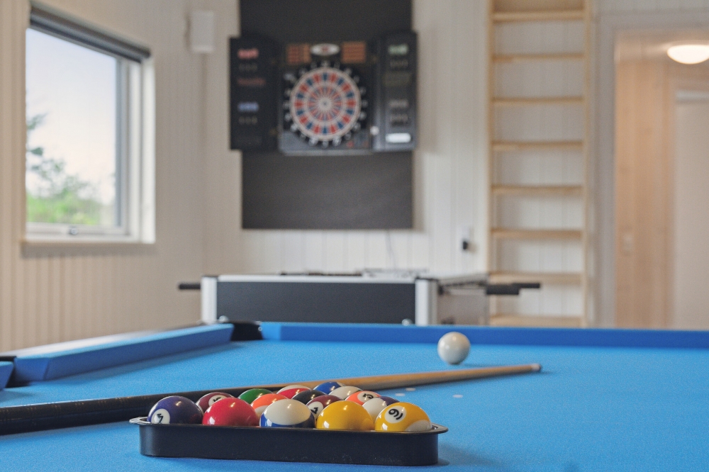 Ud over de mange timer, man kan bruge i husets pool-afdeling, så byder luksushus 634 også på billard/bordtennis og dart