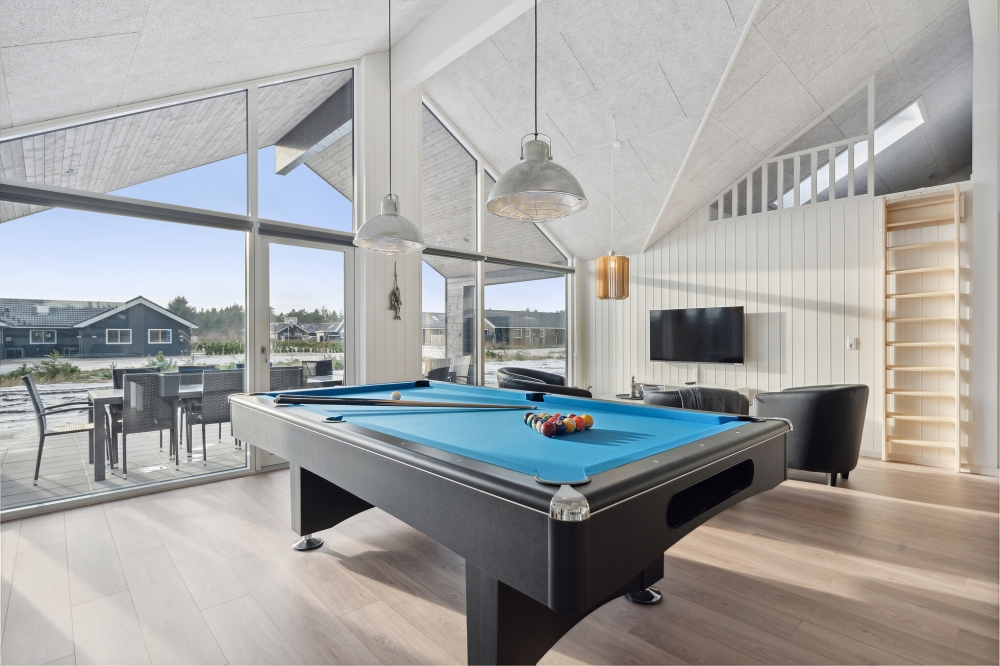 Ud over de mange timer, man kan bruge i husets pool-afdeling, så byder luksushus 653 også på billard/bordtennis og dart