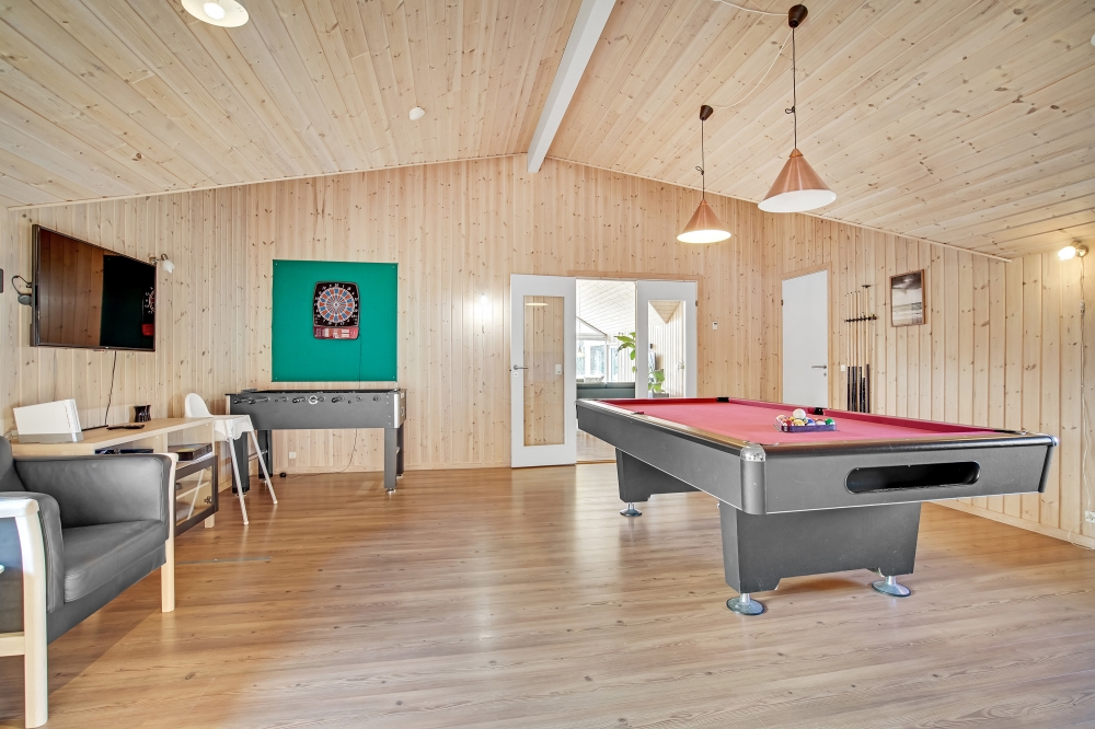 Ud over de mange timer, man kan bruge i husets pool-afdeling, så byder luksushus 236 også på billard/bordtennis og dart